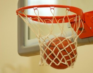a-ball-goes-into-a-basketball-net
