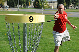 A Disc Golfer Playing Game
